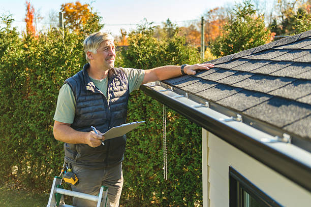 Professional Flat Roof Repair technician working in Harcourt, IA